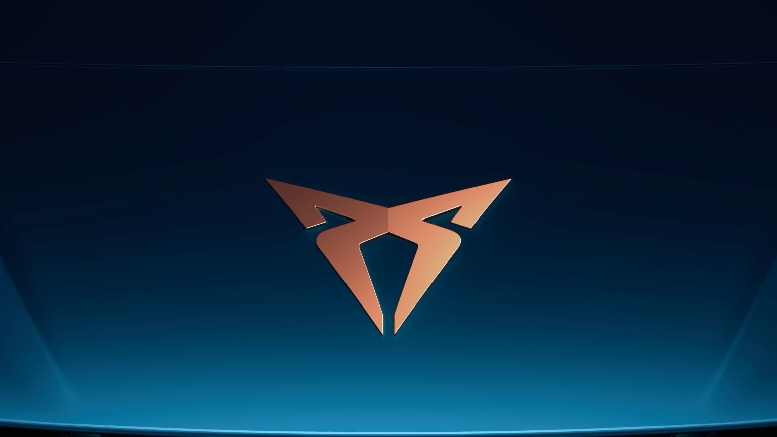 Logotip automobilske znamke Cupra na modrem ozadju.